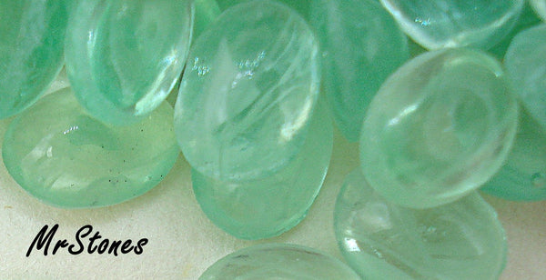 7x5mm (1685) Oval Flawed Light Emerald Cabochon Un-foiled